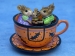 M-665x Twirling Teacups